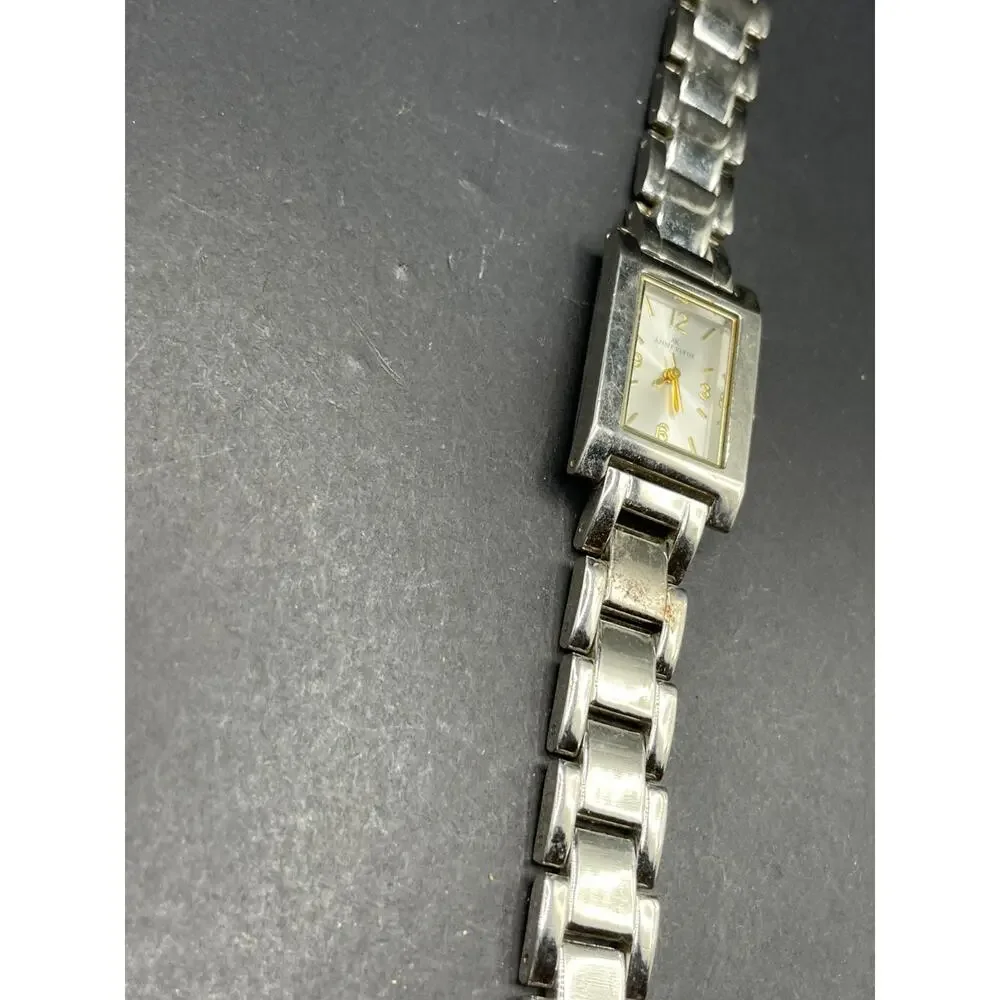 Anne Klein Women's 10/1409 Silver Dial Gold Accented Quartz Watch 21.5mm 6.5